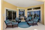 family room with leather recliners and golf views